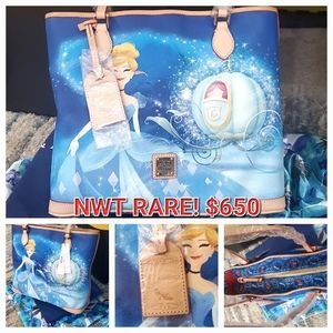 SOLD.       NWT DISNEY PARKS DOONEY AND BOURKE CINDERELLA TOTE